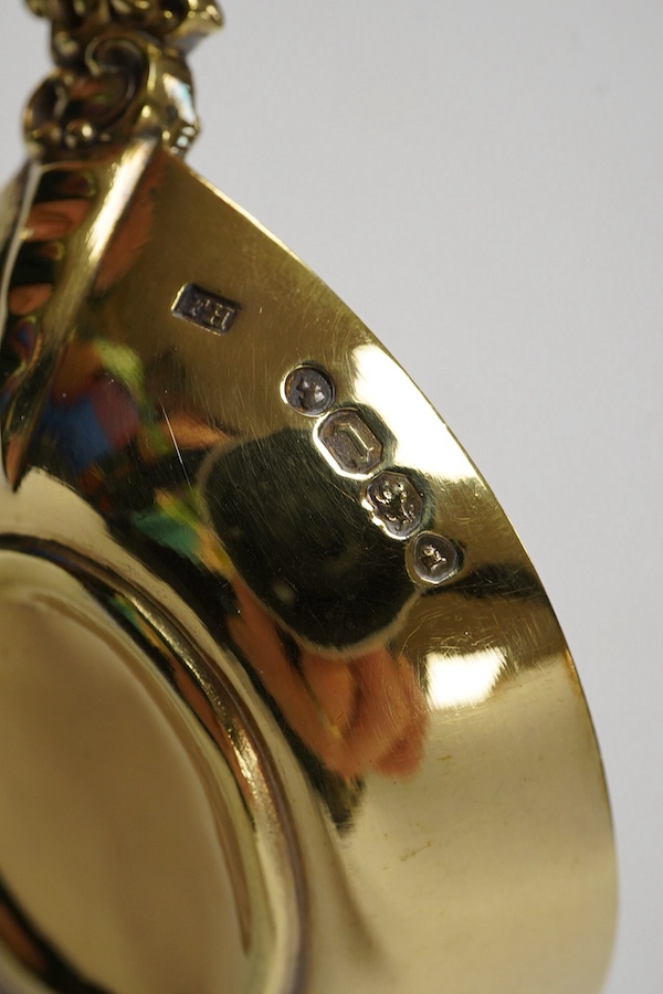 A pair of ornate Victorian silver gilt apostle spoons by Francis Higgins II, London, 1858, 18.9cm, 5.4oz. Condition - fair to good